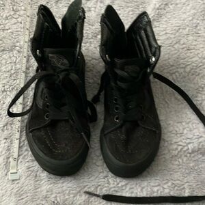 Kids size 11.5 solid black, high top, zip up in the back, Vans Skate shoes.